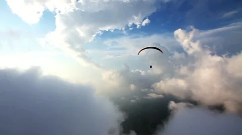 Fallowing Parasailer at the Sky Stock Footage 12703733