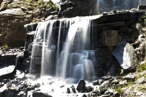 Falls in mountains Stock Photos