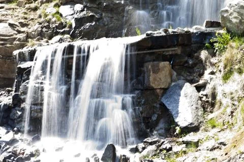 Falls in mountains Stock Photos