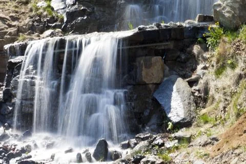 Falls in mountains Stock Photos