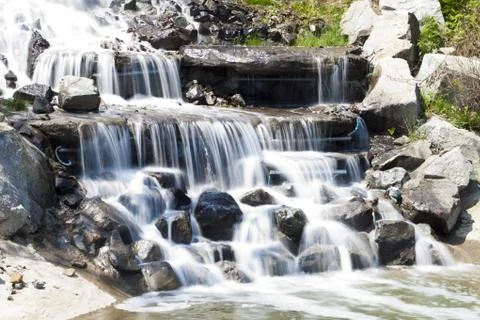 Falls in mountains Stock Photos