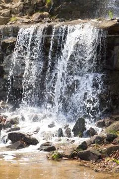 Falls in mountains Stock Photos
