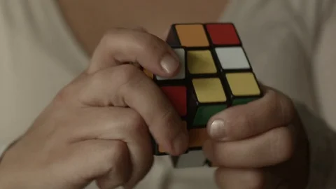 Famale hands play Rubik cube Stock Footage 80281061