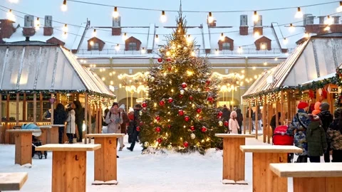 Families and couples having fun on a Christmas fair Stock Footage 168412097