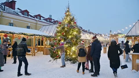 Families and couples having fun on a Christmas fair Stock Footage 168412164