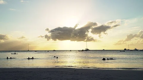 Families on the Beach in the Evening Stock Footage 82247295