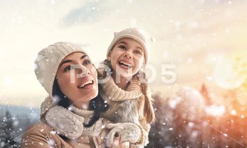 Family and winter season Stock Photos