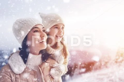 Family and winter season Stock Photos
