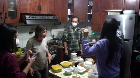 A family arguing in the kitchen using a face mask due to covid-19 Stock Footage 156443971