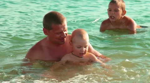 Family On The Beach Stock Footage