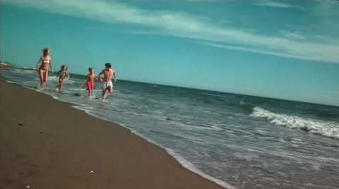 Family on beach Stock Footage 43698607