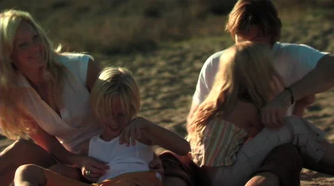 Family on beach Video stock 43698802