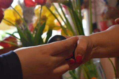 Family beating eggs for Easter close up Photos