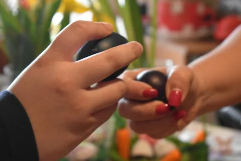 Family beating eggs for Easter close up 스톡 사진