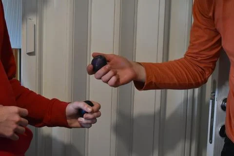 Family beating eggs for Easter close up 库存照片