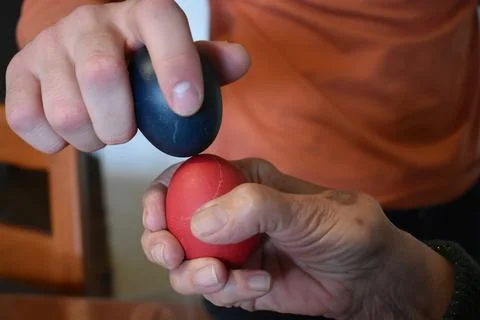 Family beating eggs for Easter close up Stock Photos