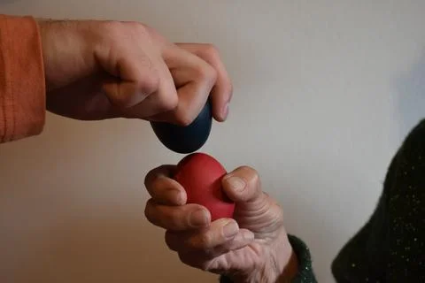 Family beating eggs for Easter close up Stock Photos