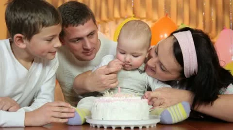Family with birthday cake Stock Footage