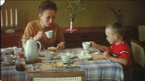 Family breakfast in the 1960s (vintage 8 mm amateur film) Stock Footage