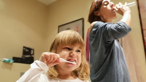 Family brushing teeth Stock Footage 70605696