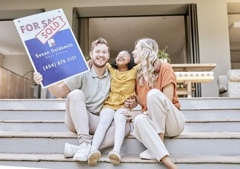Family, buy house and sold sign with a smile about property and new real estate Stock Photos