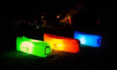 Family camping with inflatable sofas Stock Photos
