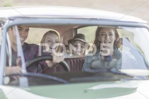 Family in car together, taking road trip Stock Photos