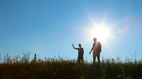 Family celebrating success waving happily with hands into camera. Stock Footage