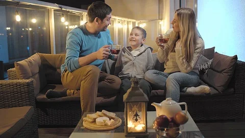 Family celebrating, talking, using smartphone, drinking tea. long distance. Stock Footage 128184957