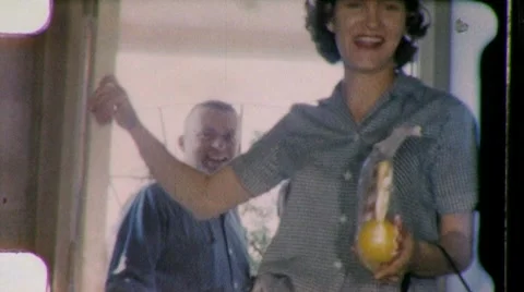 Family Comes Welcome Home Opens Front Door 1960s Vintage Film Home Movie 627 Stock Footage
