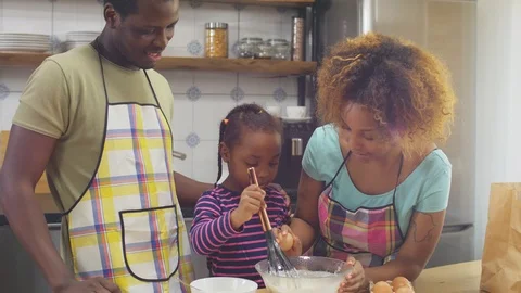 Family cooking breakfast together Stock Footage