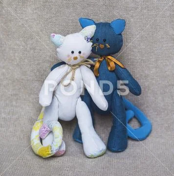 Family couple toy cats Stock Photos