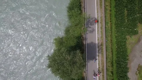 Family Cyclists on a cycle path Stock Footage 129427087