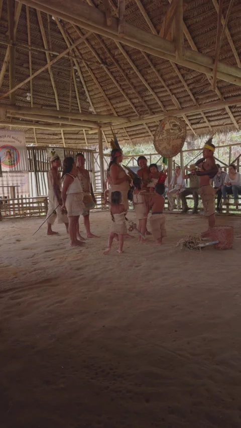 Family Dance Circle in Amazonas Indigenous Maloca Hut Vertical Stock Footage 338020670