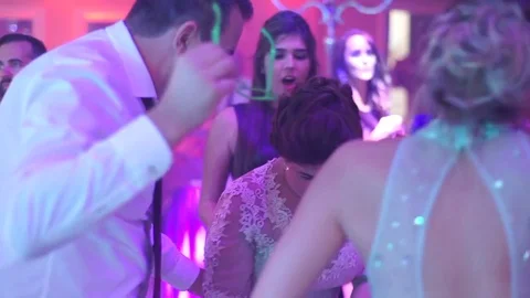 Family dancing at the wedding dance floor Stock Footage