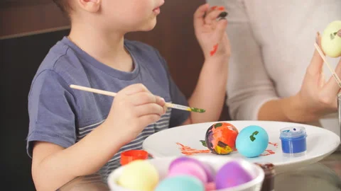 Family decorating Easter eggs Stock Footage 103957019