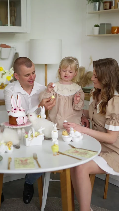Family Easter celebration in kitchen. Concept of family traditions for Easter. Stock Footage 278022398