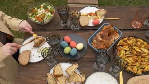 Family is eating during Easter dinner Stock Footage 122540443