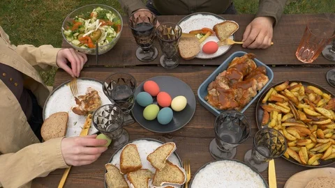 Family is eating during Easter dinner Stock Footage 122540563