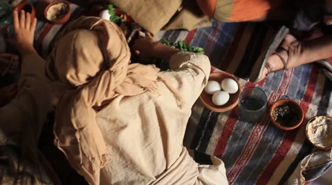 Family Eats Passover Dinner in Biblical Reenactment Stock Footage 51461743