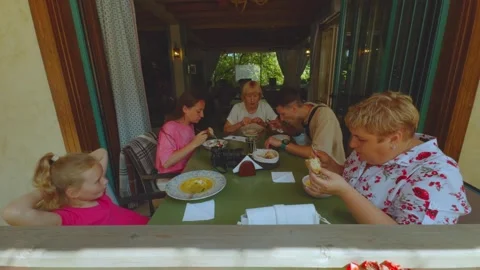 The family eats at the restaurant 스톡 동영상 331851822