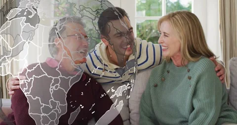 Family embracing by window, wireframe globe fading, rotating overlaying them Stock Footage 316892042