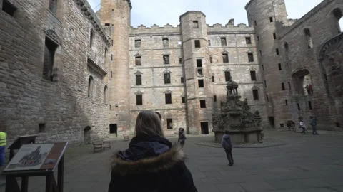 Family exploring Linlithgow Palace Stock Footage 141636715