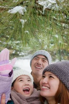 Family exploring in park in winter Stock Photos