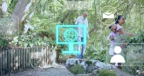 Family exploring path while tech monitor icon fading in causing overlaying icons Stock Footage 320482046
