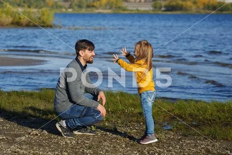 Family. Father and daughter. Leisure at water Stock Photos