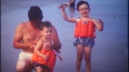Family Fun On A Day At The Beach  1950S Vintage Film Home Movie 3237 Stock Footage