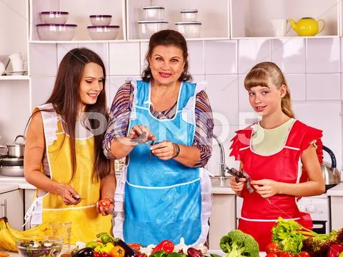 Family With Grandmother And Child At Kitchen