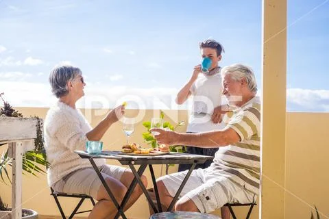 Family happiness leisure activity outdoor concept for grandfathers and grandm Stock Photos
