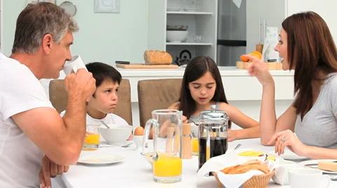 Family having a breakfast Stock Footage 1096178
